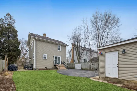 a view of a backyard with a house