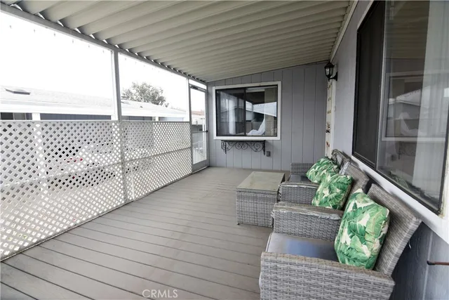 a balcony with furniture