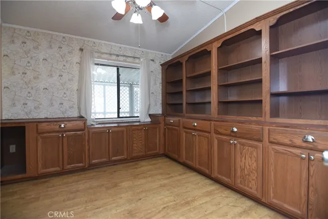a room with cabinets and window