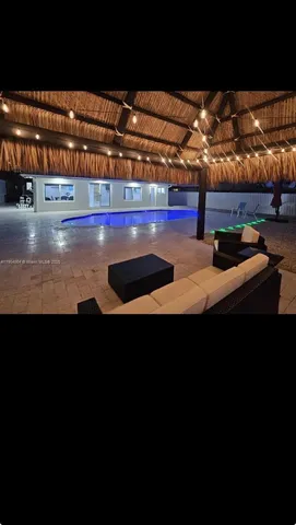 a view of an outdoor space and swimming pool