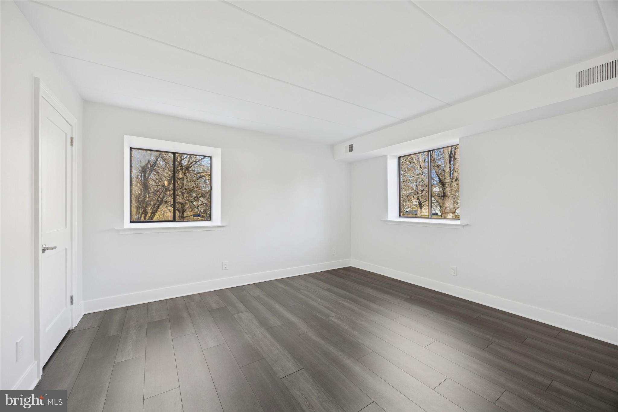 40 Le Forge Court, Unit 40 Chesterbrook, PA 19087 - Photo 11 of 16 a view of a room with wooden floor and window