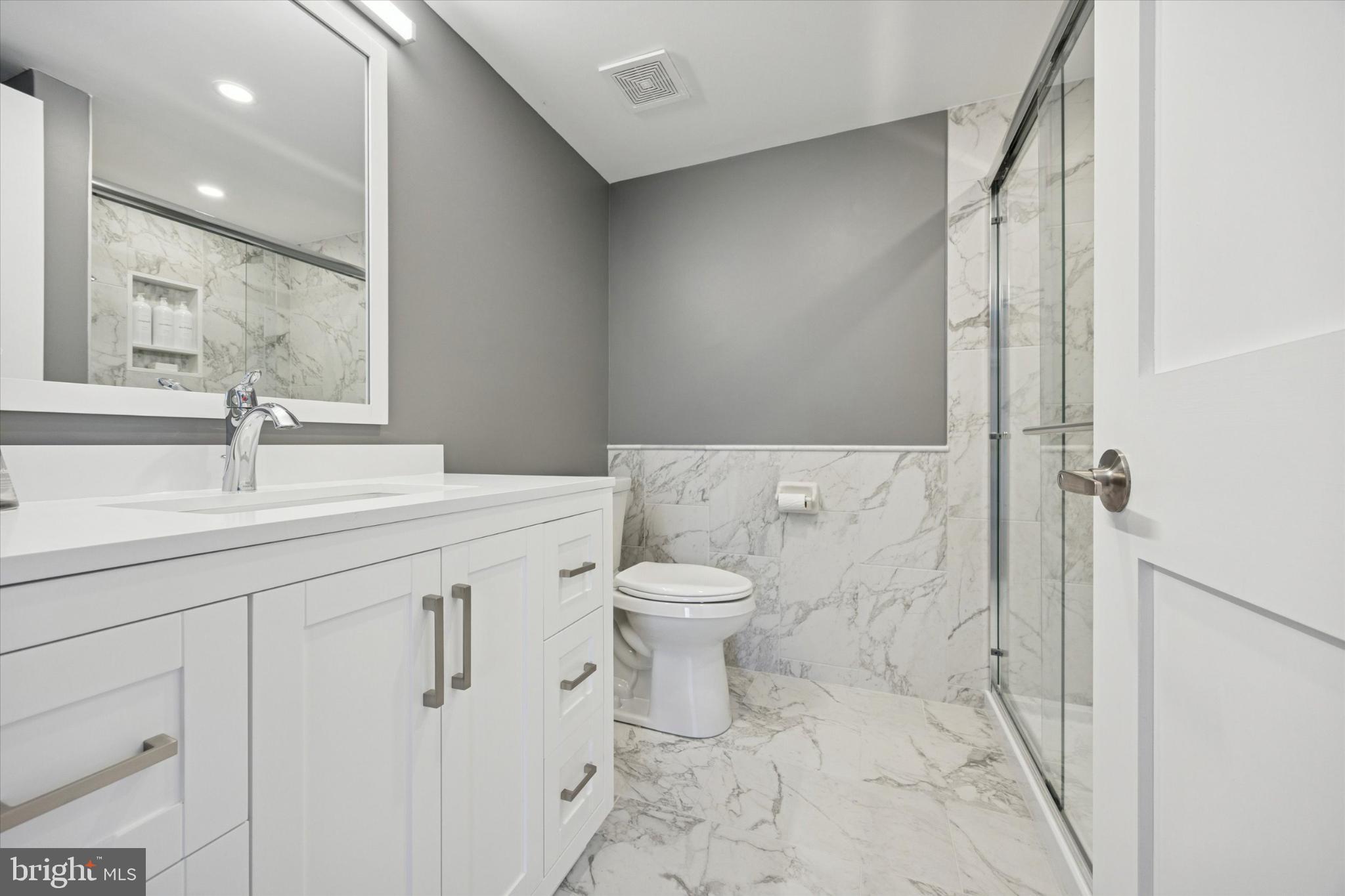 40 Le Forge Court, Unit 40 Chesterbrook, PA 19087 - Photo 10 of 16 a bathroom with a sink toilet and shower