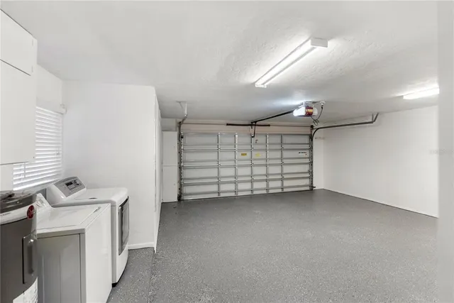 a view of a garage room and a window