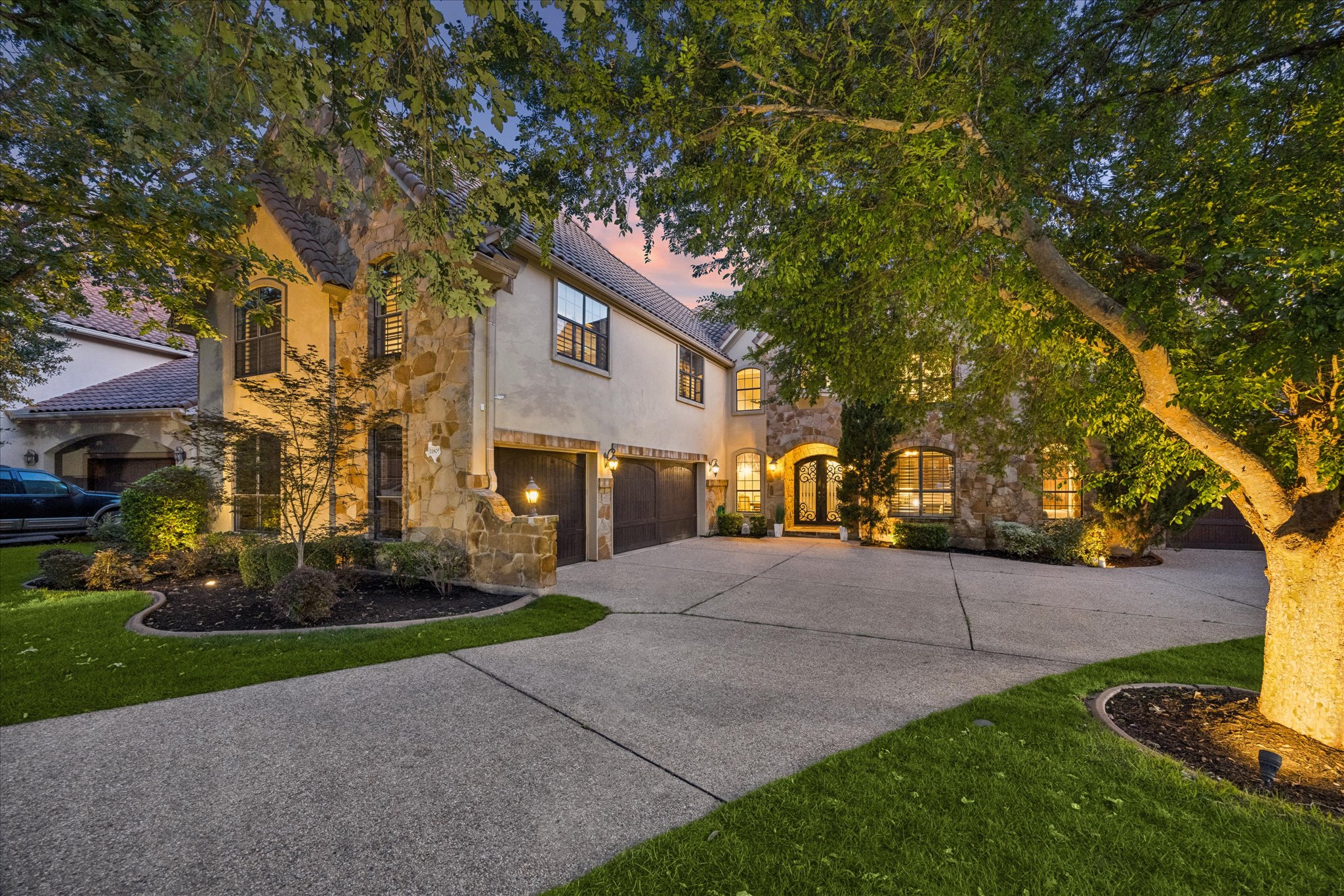 11805 Ranchview Court Austin, TX 78732 - Photo 3 of 36 Stone and stucco exterior with a tiled roof