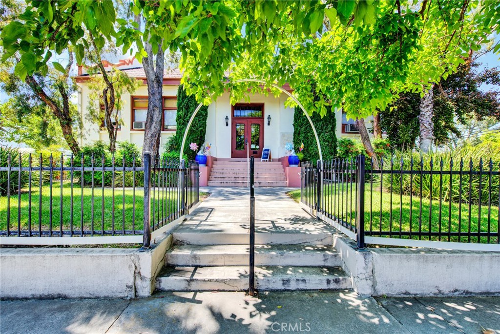618 4th Street Corning, CA 96021 - Photo 16 of 36 a view of a house with a yard