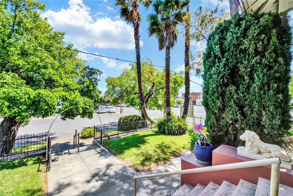 618 4th Street Corning, CA 96021 - Photo 19 of 36 a view of a chair and table in the garden