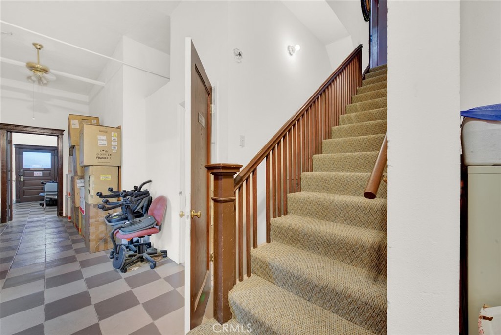 618 4th Street Corning, CA 96021 - Photo 25 of 36 a view of a hallway with wooden floor and furniture
