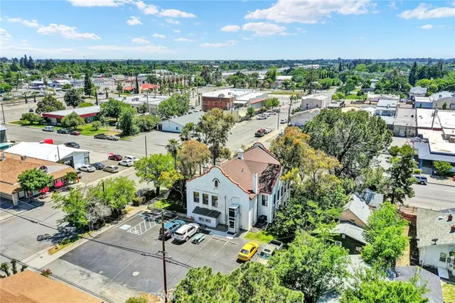 a view of a park with iron fence