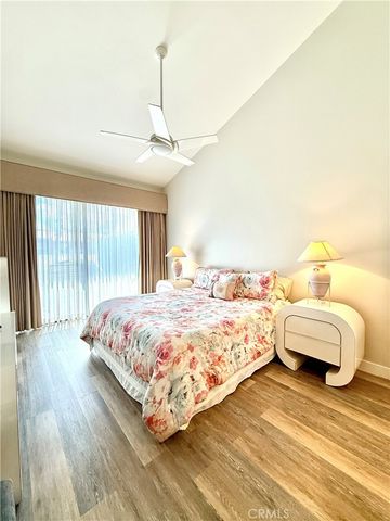 a view of swimming pool with a table and chairs
