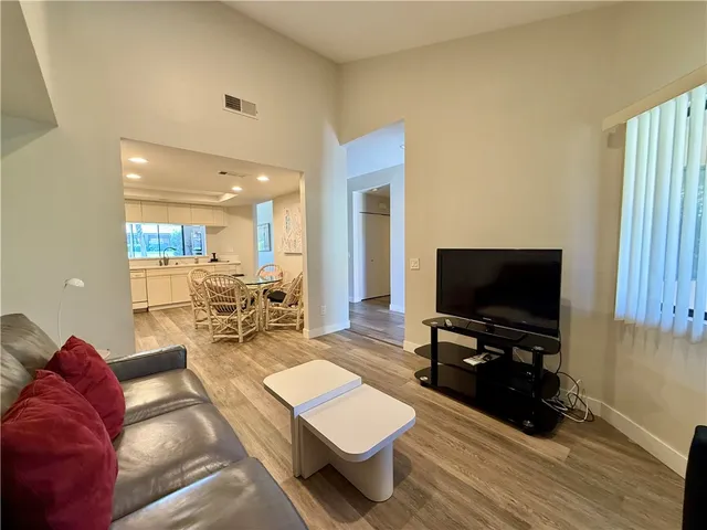 a view of a table and chairs in the garden