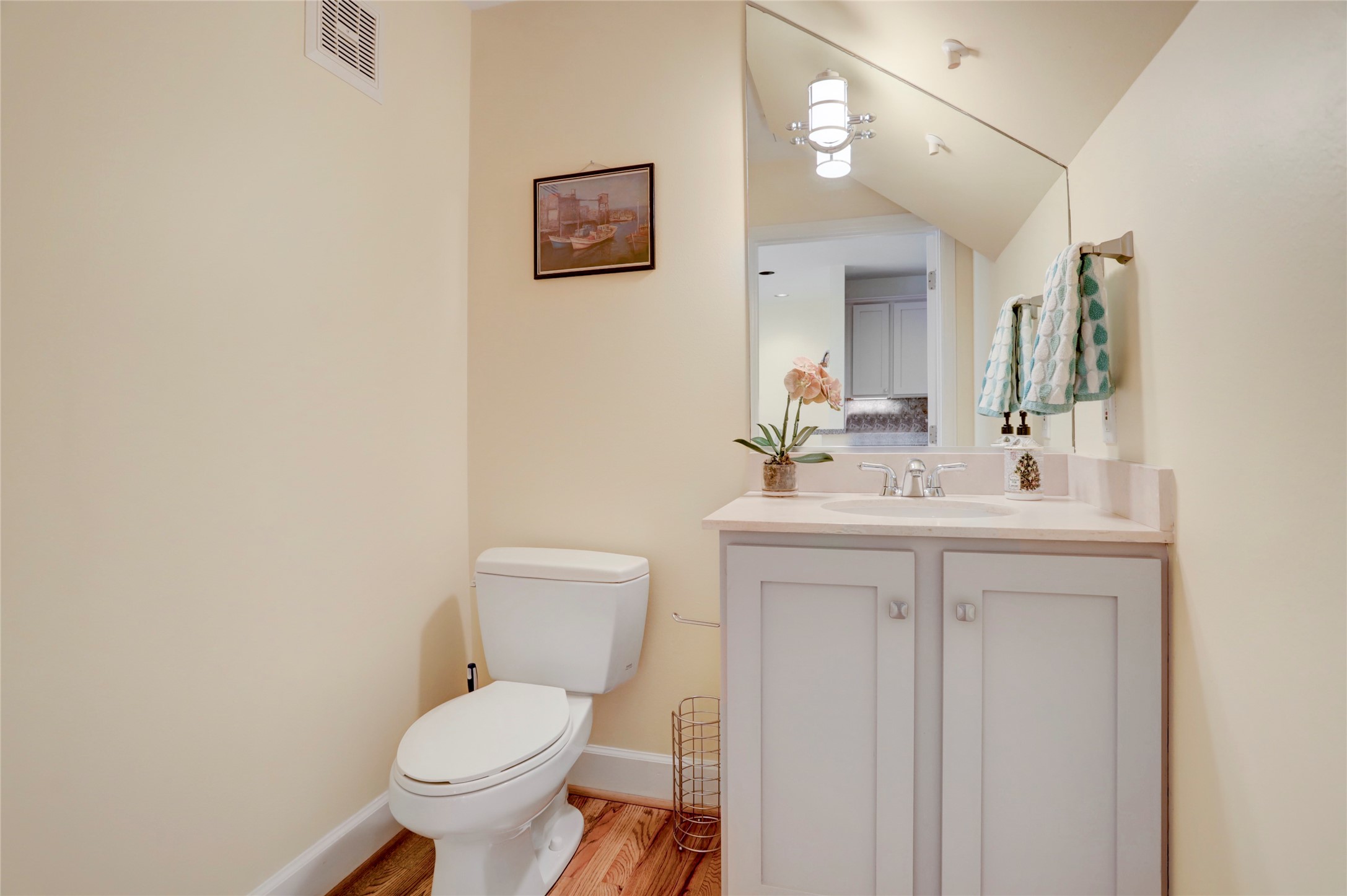 2520 Robinhood Street, Unit 1008 Houston, TX 77005 - Photo 13 of 27 a bathroom with a toilet sink and mirror