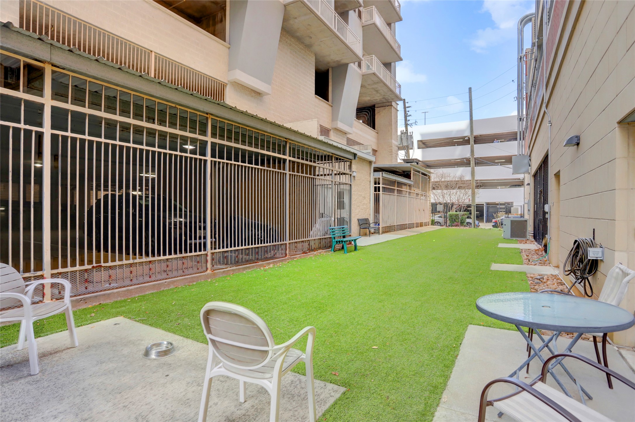 2520 Robinhood Street, Unit 1008 Houston, TX 77005 - Photo 23 of 27 a view of outdoor space yard deck and furniture