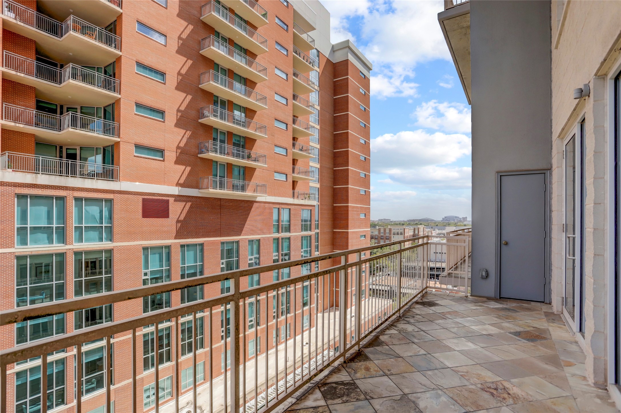 2520 Robinhood Street, Unit 1008 Houston, TX 77005 - Photo 8 of 27 a view of building from balcony