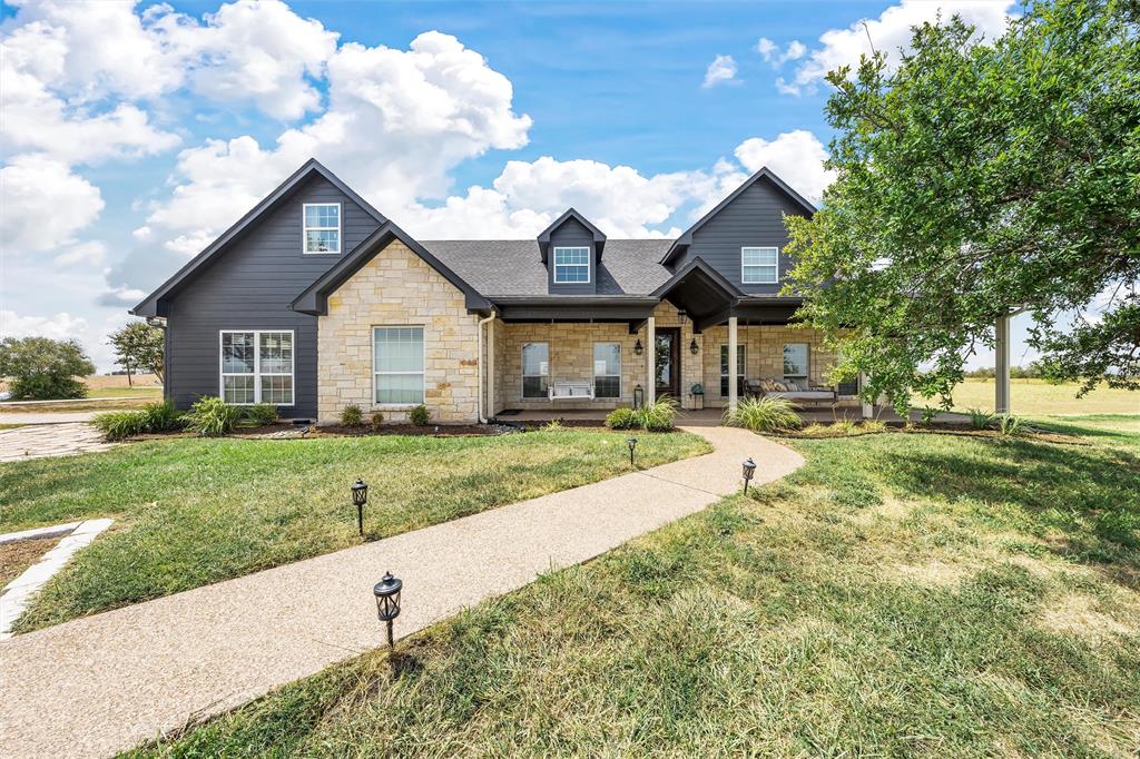 2045 Iron Bridge Road Lorena, TX 76655 - Photo 1 of 40 a front view of house with yard and green space