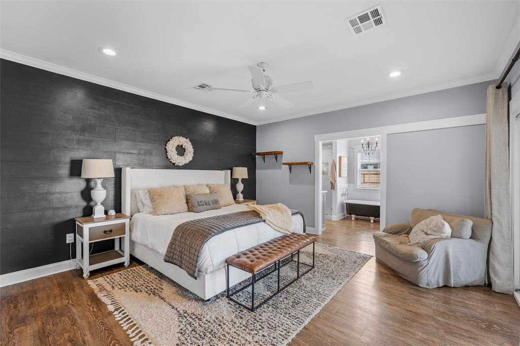 2045 Iron Bridge Road Lorena, TX 76655 - Photo 13 of 40 a spacious bedroom with a bed and a couch