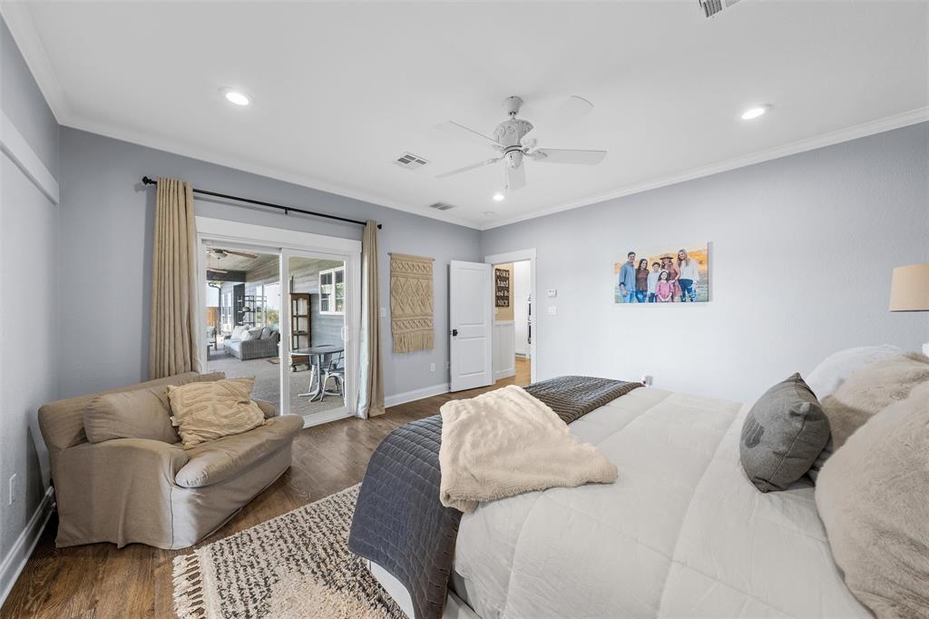 2045 Iron Bridge Road Lorena, TX 76655 - Photo 14 of 40 a bedroom with a large bed couch and a window