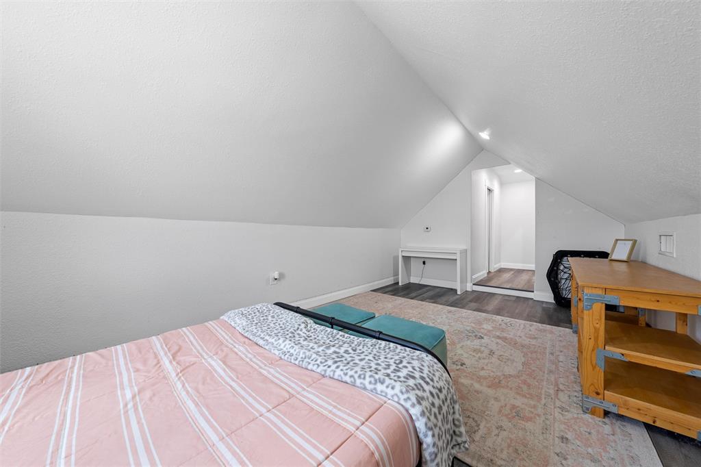 2045 Iron Bridge Road Lorena, TX 76655 - Photo 28 of 40 a bedroom with a bed and a cabinets