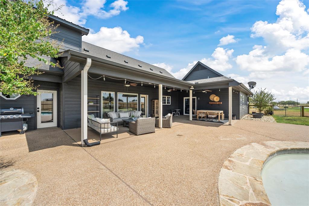 2045 Iron Bridge Road Lorena, TX 76655 - Photo 32 of 40 a view of a house with backyard porch and sitting area