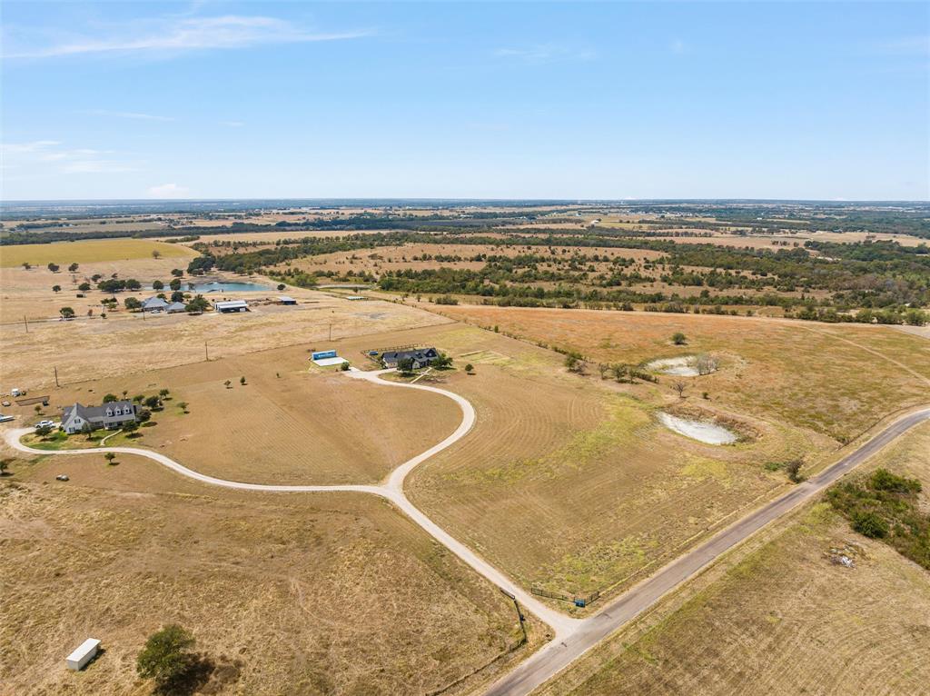 2045 Iron Bridge Road Lorena, TX 76655 - Photo 39 of 40 a view of an ocean and beach