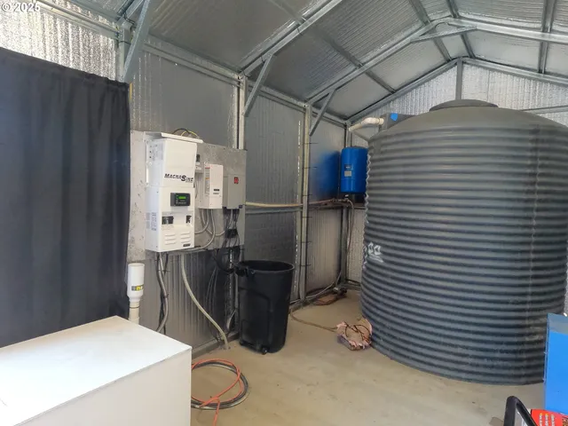 a bathroom with a shower and a sink