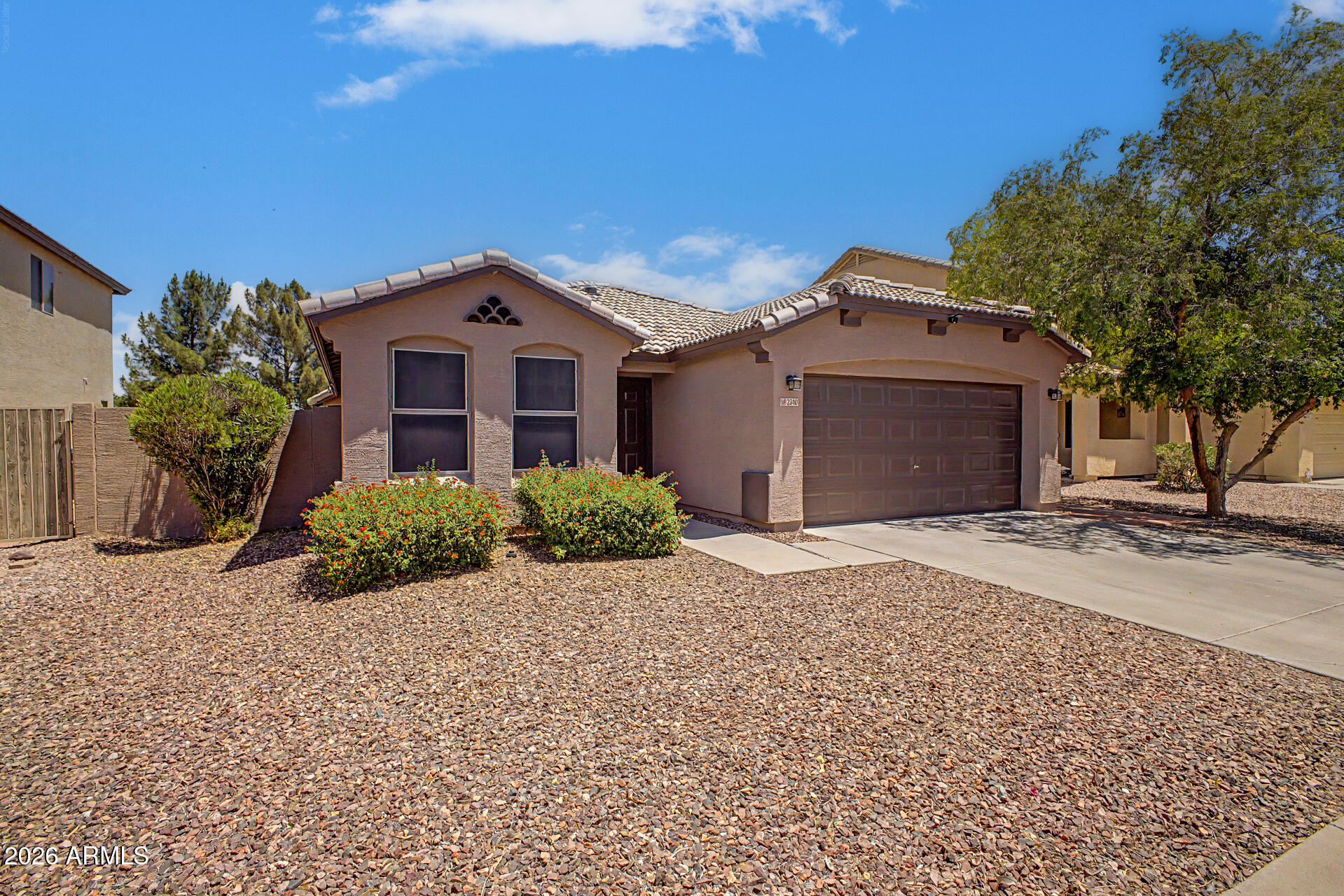 2340 West Apollo Road Phoenix, AZ 85041 - Photo 2 of 26 a front view of a house with a yard