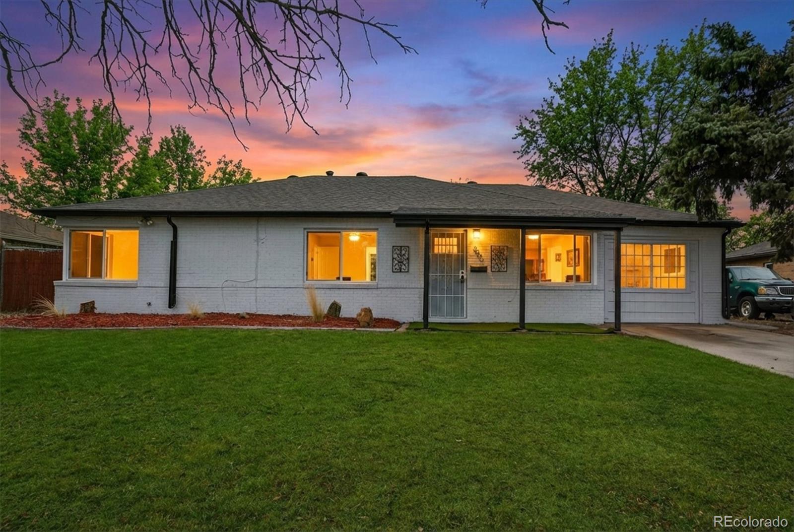 a backyard of a house with lots of green space