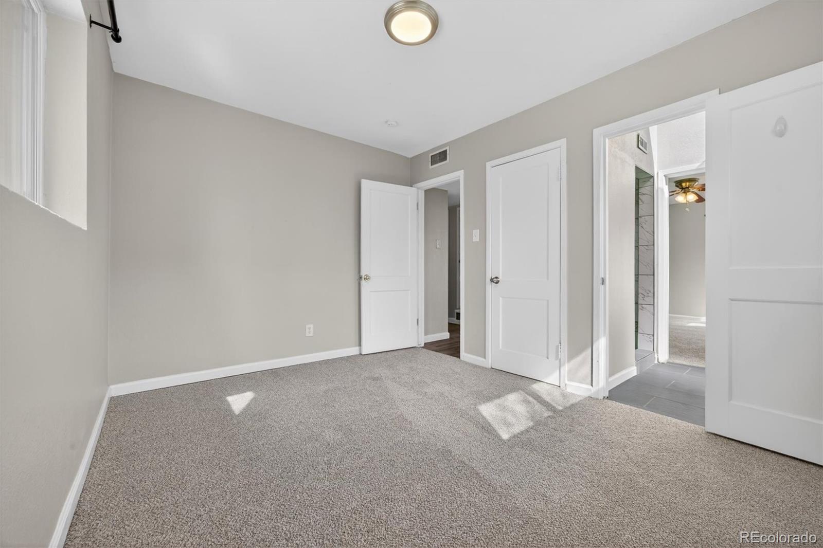 901 Racine Street Aurora, CO 80011 - Photo 16 of 29 a view of an empty room