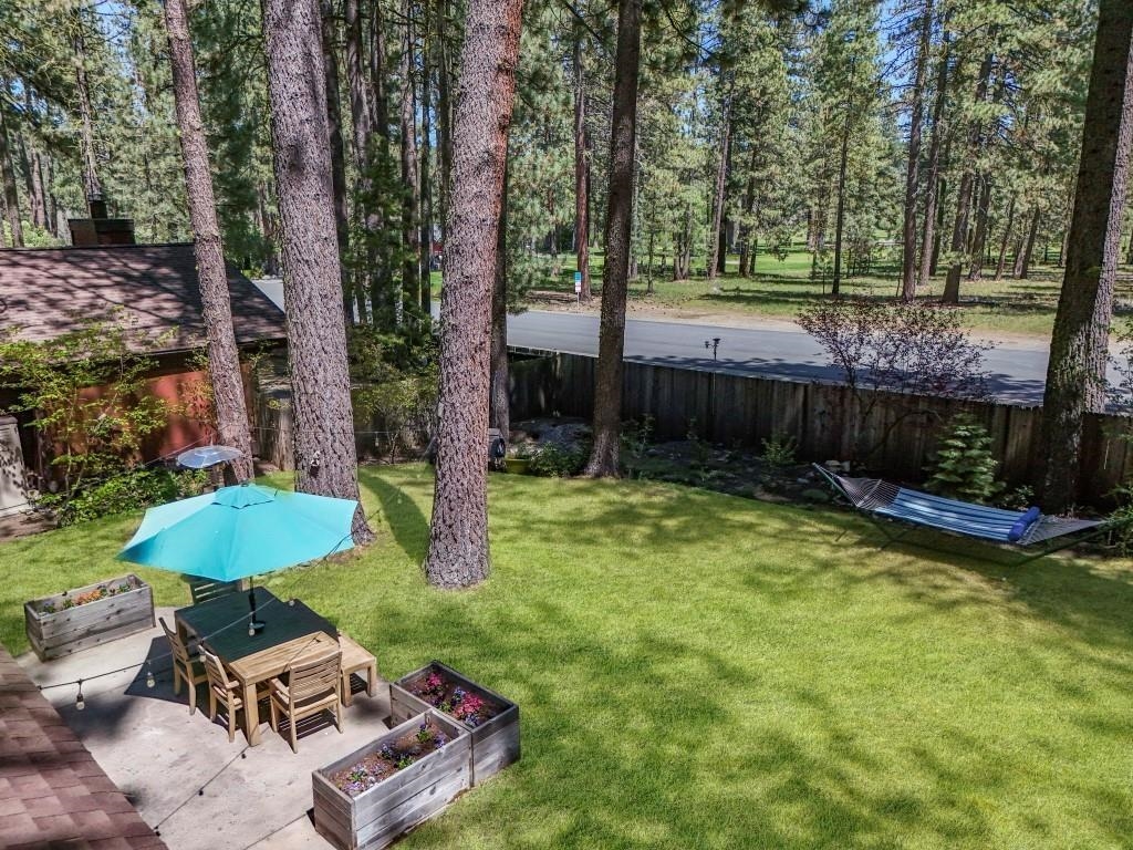 10 Graeagle Meadows Road Graeagle, CA 96103 - Photo 18 of 25 a view of a backyard with furniture and a backyard