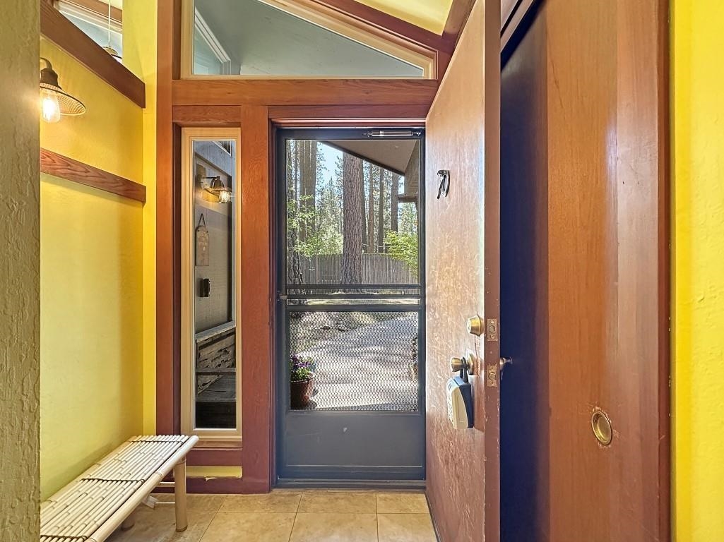 10 Graeagle Meadows Road Graeagle, CA 96103 - Photo 3 of 25 a view of a bathroom with a glass door