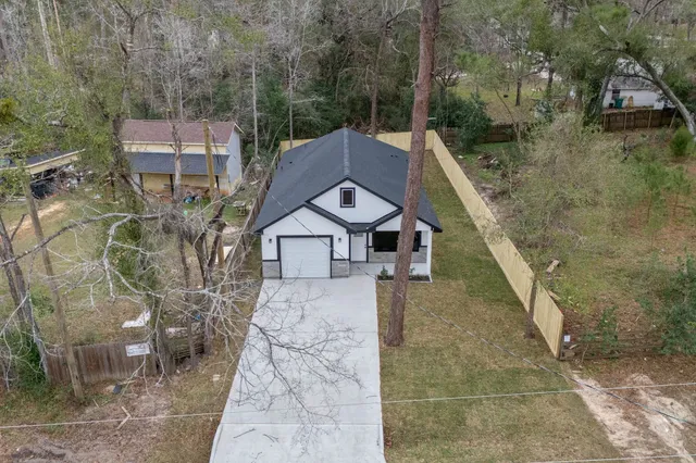a house with trees in front of it