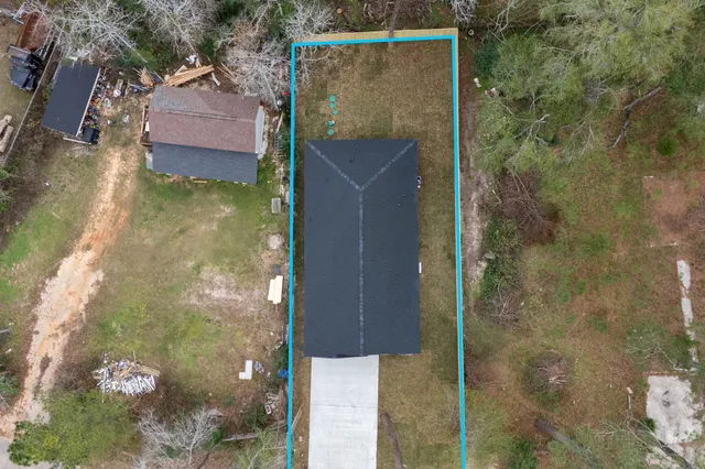 view of a house with a yard