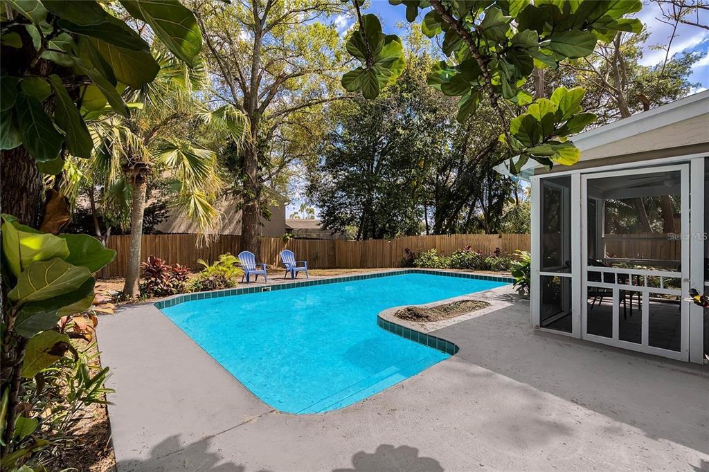 5607 Spring Run Avenue Orlando, FL 32819 - Photo 4 of 20 a view of a swimming pool with lounge chair