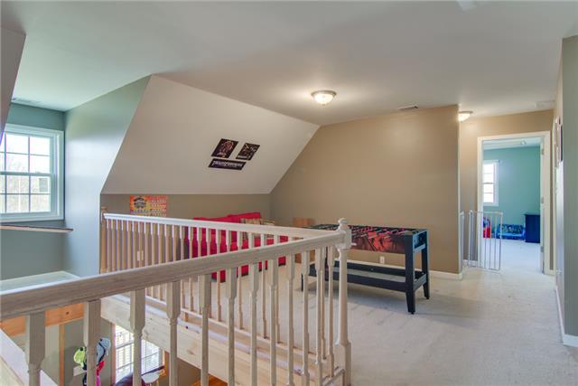8813 West Sheepneck Road Mount Pleasant, TN 38474 - Photo 14 of 19 OPEN WOOD BEAMS FROM REC ROOM TO LIVING ROOM