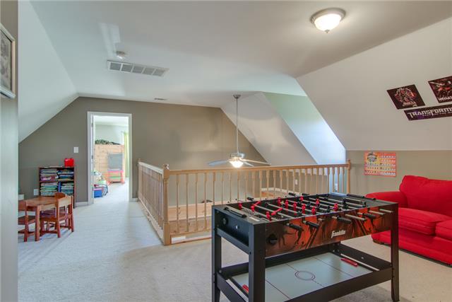 8813 West Sheepneck Road Mount Pleasant, TN 38474 - Photo 15 of 19 PLENTY OF ROOM IN REC AREA FOR CHILDREN TO PLAY, GAMES FOR THE TEENS, LARGE TV AND FURNITURE TO RELAX ON