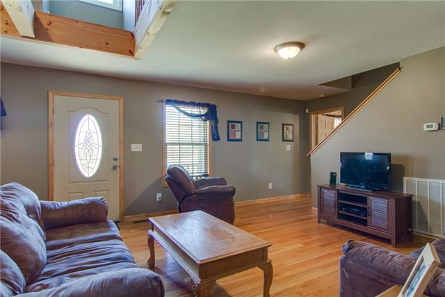 8813 West Sheepneck Road Mount Pleasant, TN 38474 - Photo 5 of 19 ENTERTAINING LIVING ROOM WITH GORGEOUS HARD WOOD FLOORS