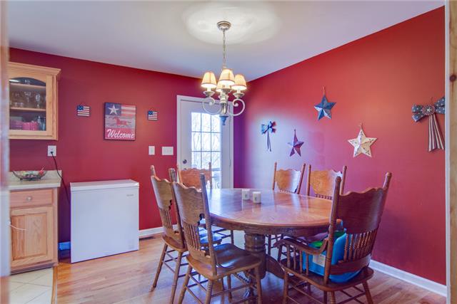 8813 West Sheepneck Road Mount Pleasant, TN 38474 - Photo 8 of 19 EAT IN KITCHEN AREA HAS DOOR LEADING OUTSIDE TO THE DECK