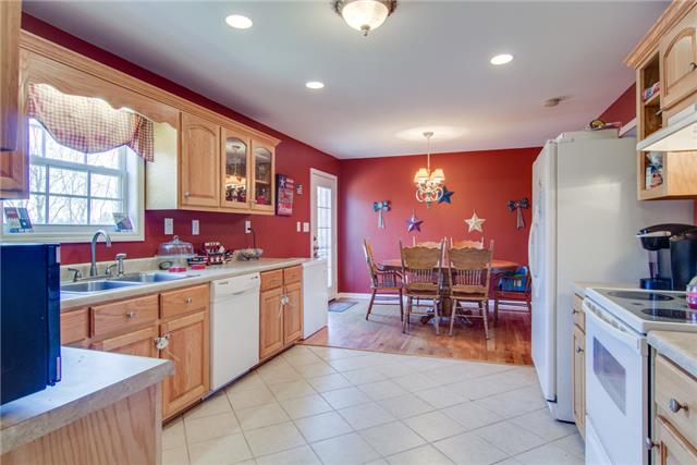 8813 West Sheepneck Road Mount Pleasant, TN 38474 - Photo 9 of 19 BEAUTIFUL COUNTRY KITCHEN WITH APPLIANCES THAT REMAIN WITH THE HOME
