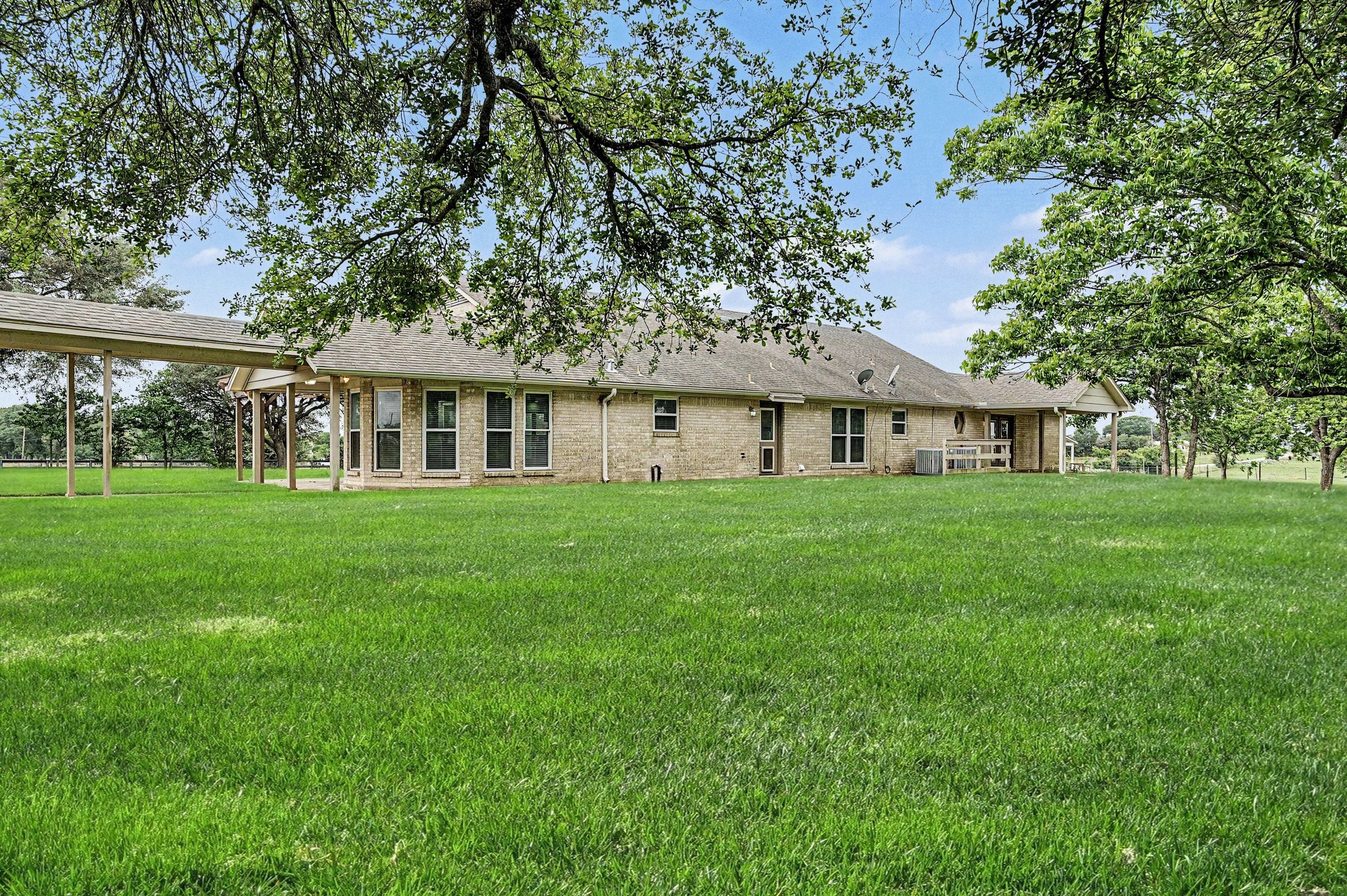 35564 Brumlow Road Hempstead, TX 77445 - Photo 26 of 46 a front view of a house with yard and green space