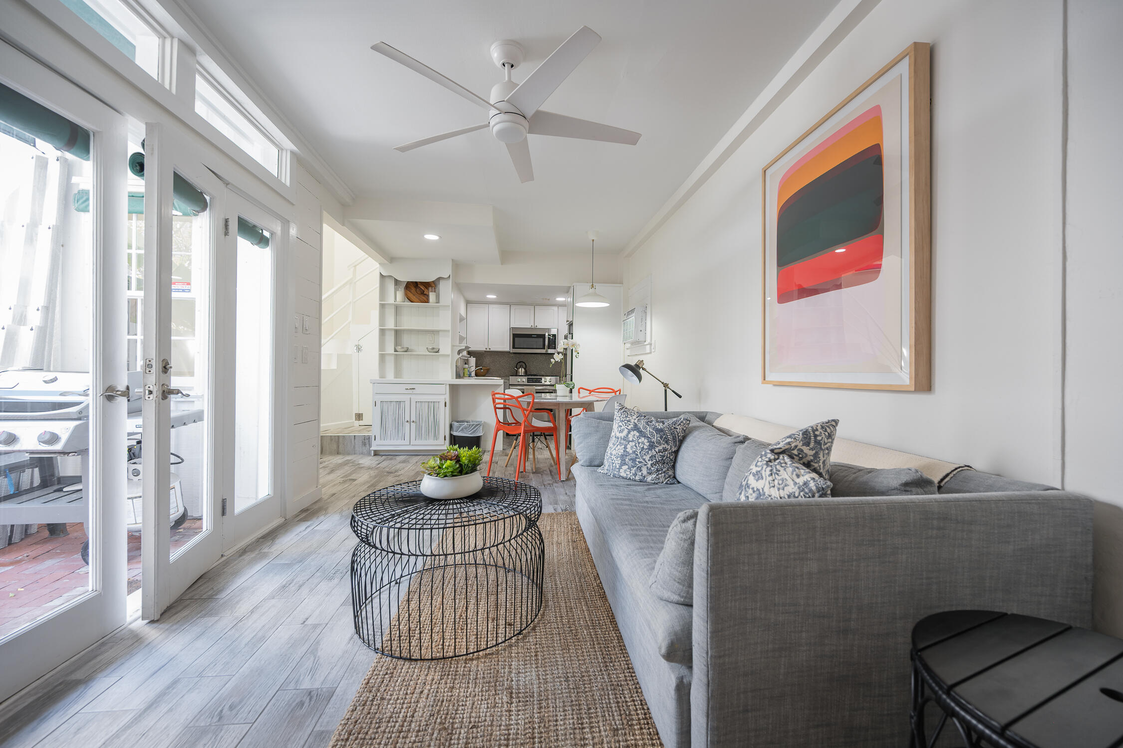 609 1/2 Margaret Street Key West, FL 33040 - Photo 1 of 35 a living room with furniture and a wooden floor