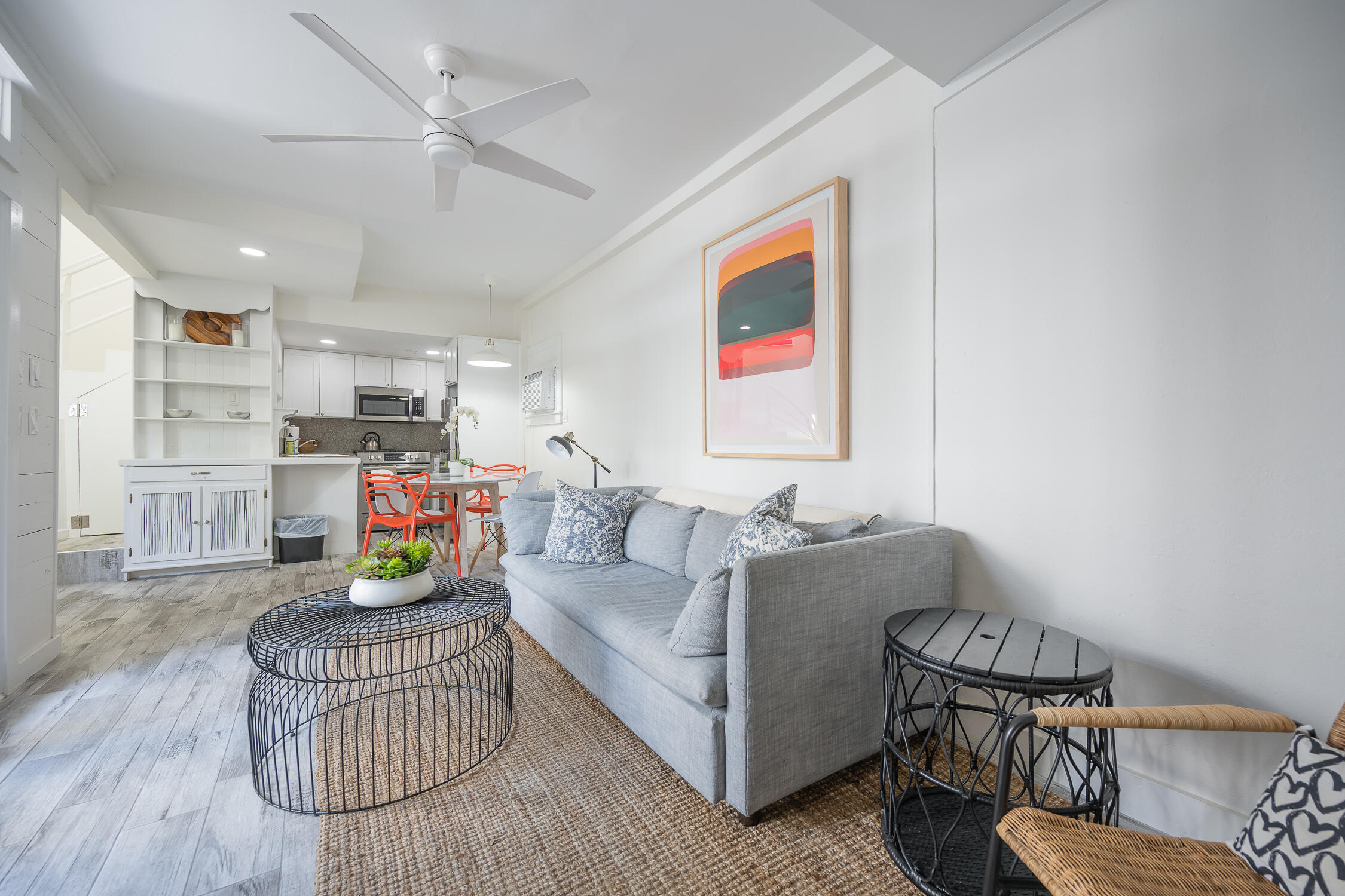 609 1/2 Margaret Street Key West, FL 33040 - Photo 27 of 35 a living room with furniture and a wooden floor