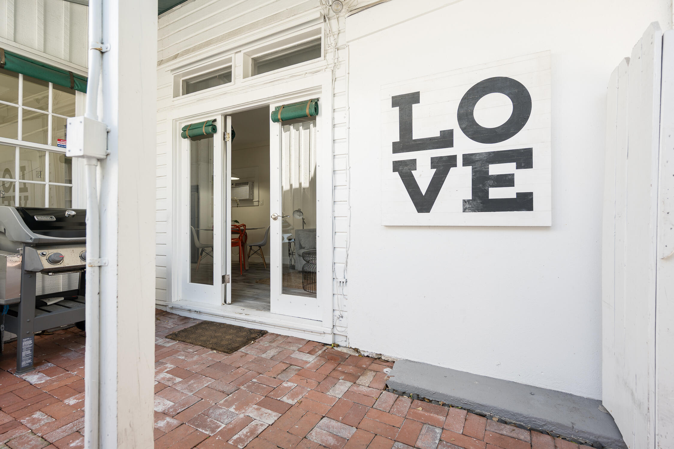 609 1/2 Margaret Street Key West, FL 33040 - Photo 31 of 35 a view of a door and a window