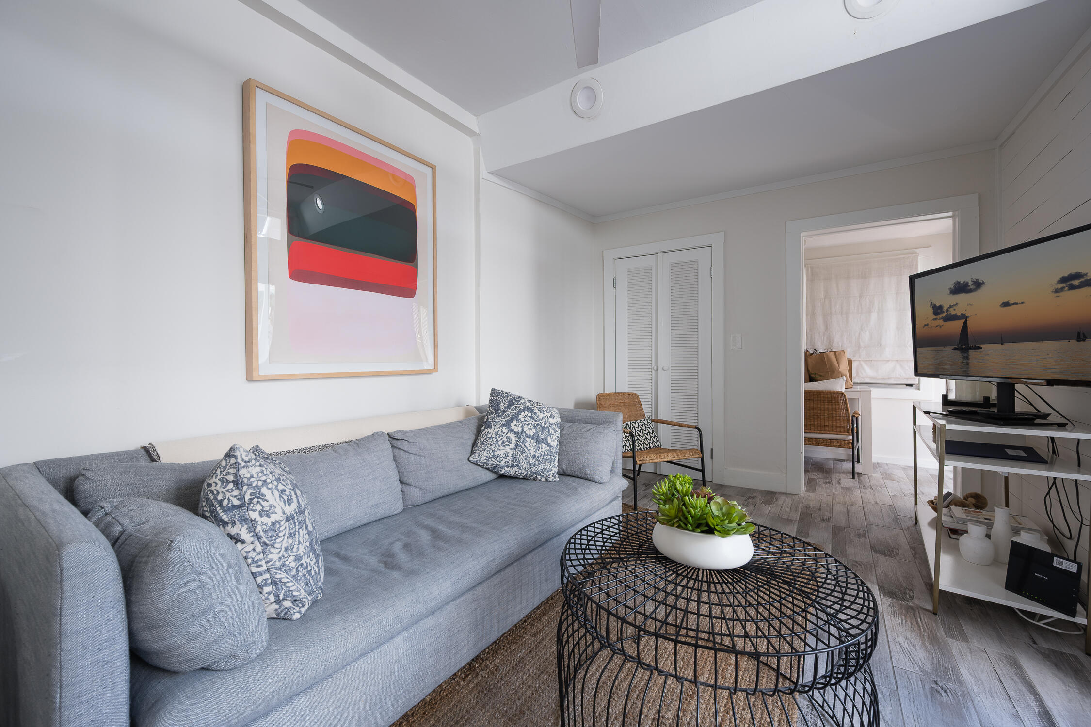 609 1/2 Margaret Street Key West, FL 33040 - Photo 33 of 35 a living room with furniture kitchen view and a window