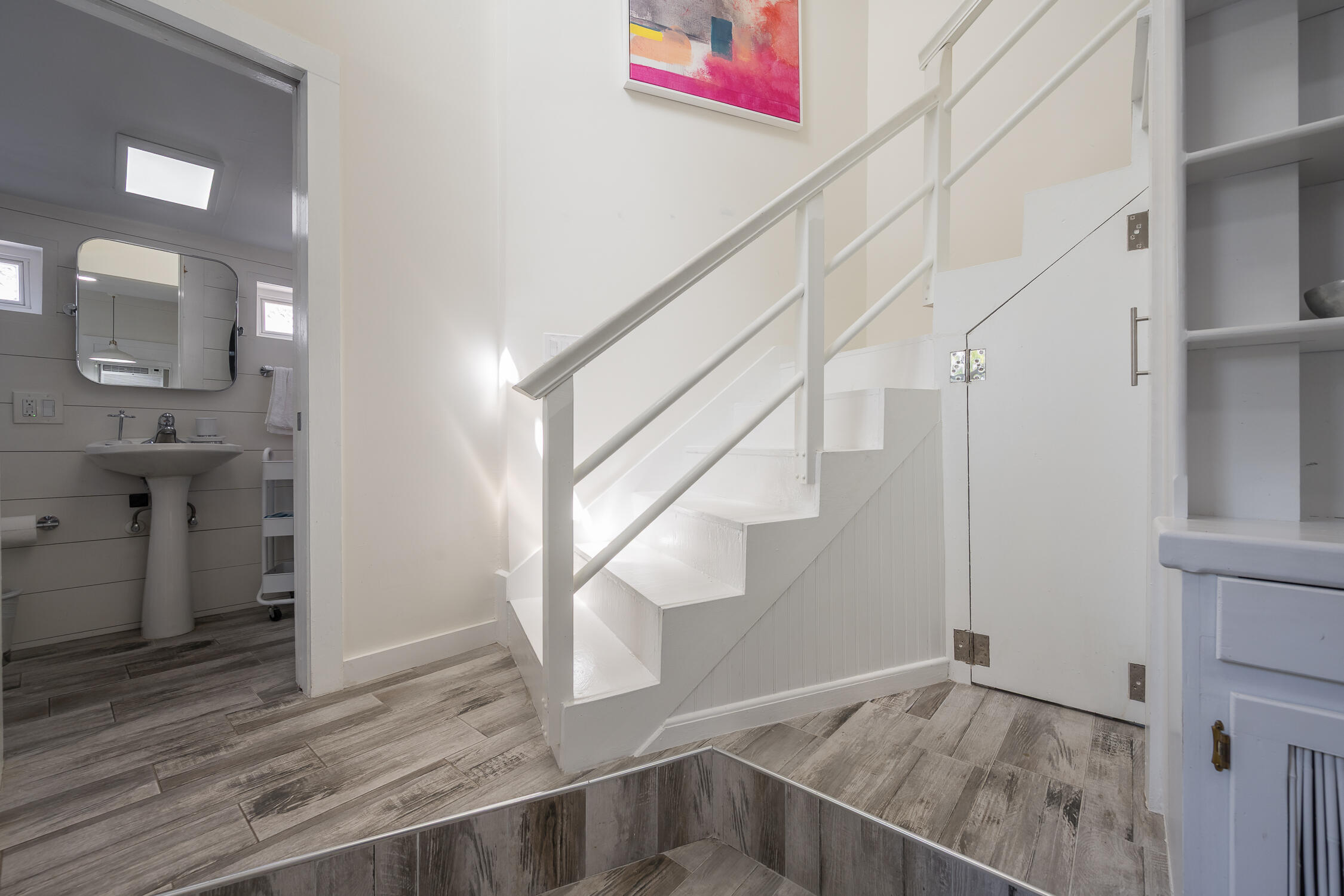 609 1/2 Margaret Street Key West, FL 33040 - Photo 7 of 35 a view of entryway and hall with wooden floor