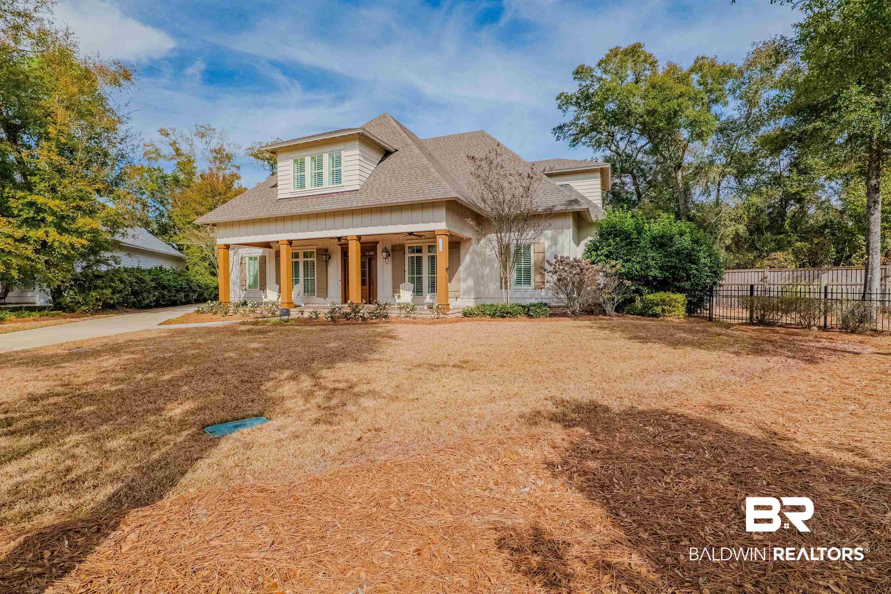 708 Manning Place Fairhope, AL 36532 - Photo 56 of 58 View of front of house with a porch and a front yard