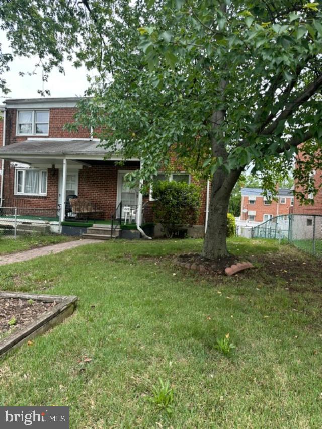 1619 Inverness Avenue Baltimore, MD 21230 - Photo 2 of 30 a front view of a house with garden
