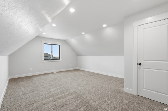 2970 North Mahogany Vly Road Logan, UT 84341 - Photo 29 of 39 Additional living space with light carpet and recessed lighting
