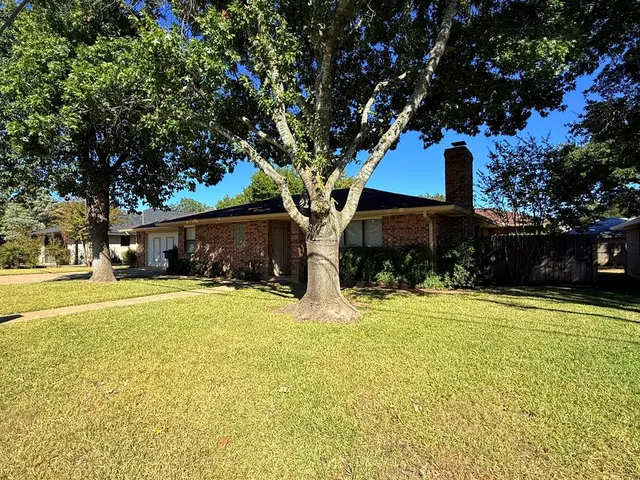 a house view with a outdoor space
