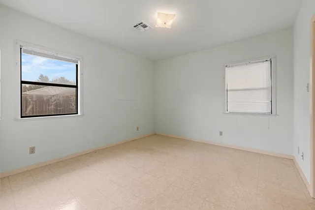 an empty room with a window