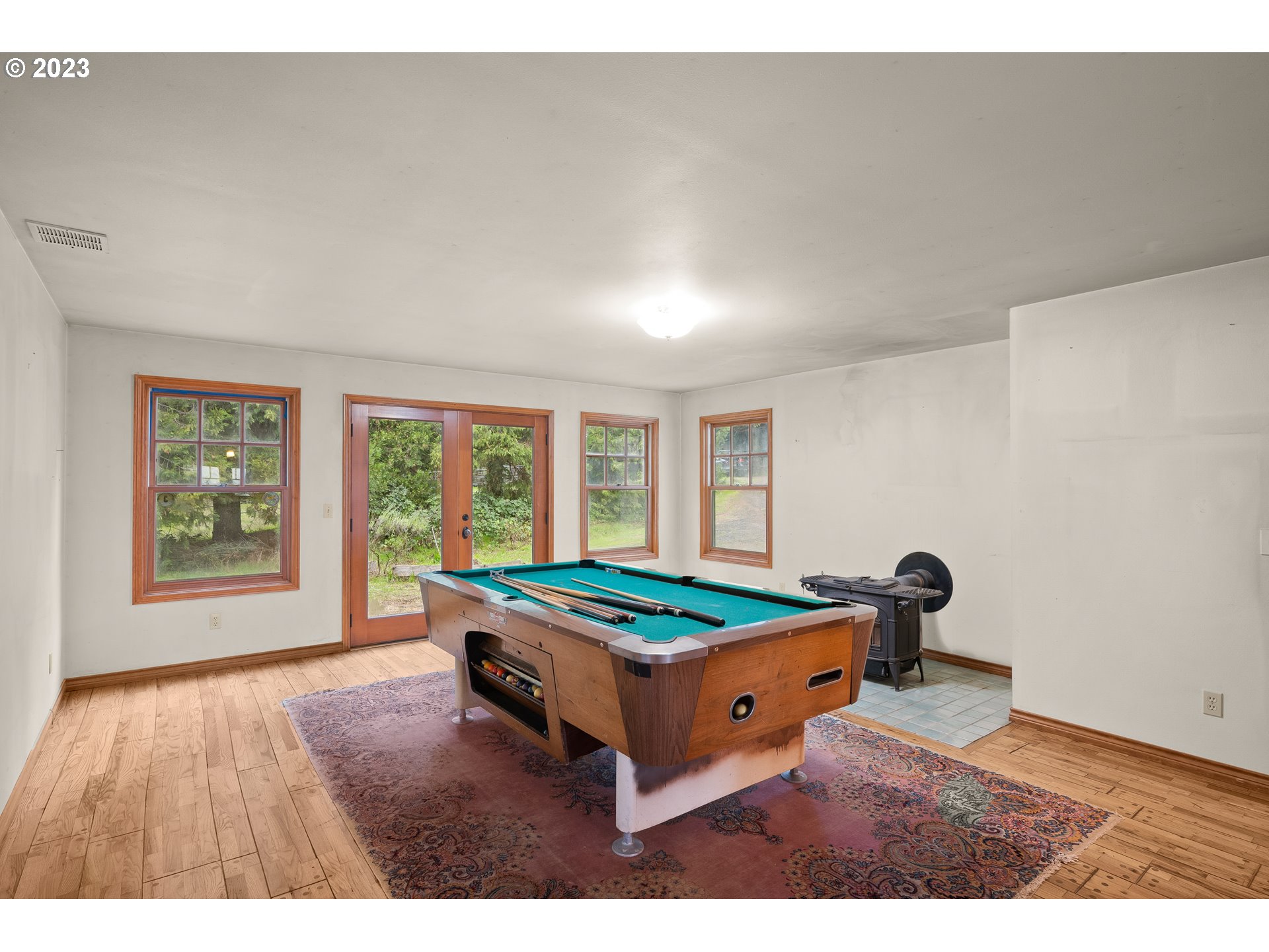 15190 Southwest Bell Road Sherwood, OR 97140 - Photo 20 of 44 a room with pool table and windows