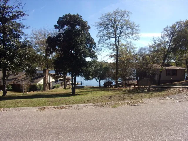a view of road with trees